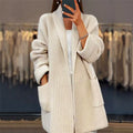 Cristina | Knitted cardigan with functional pockets